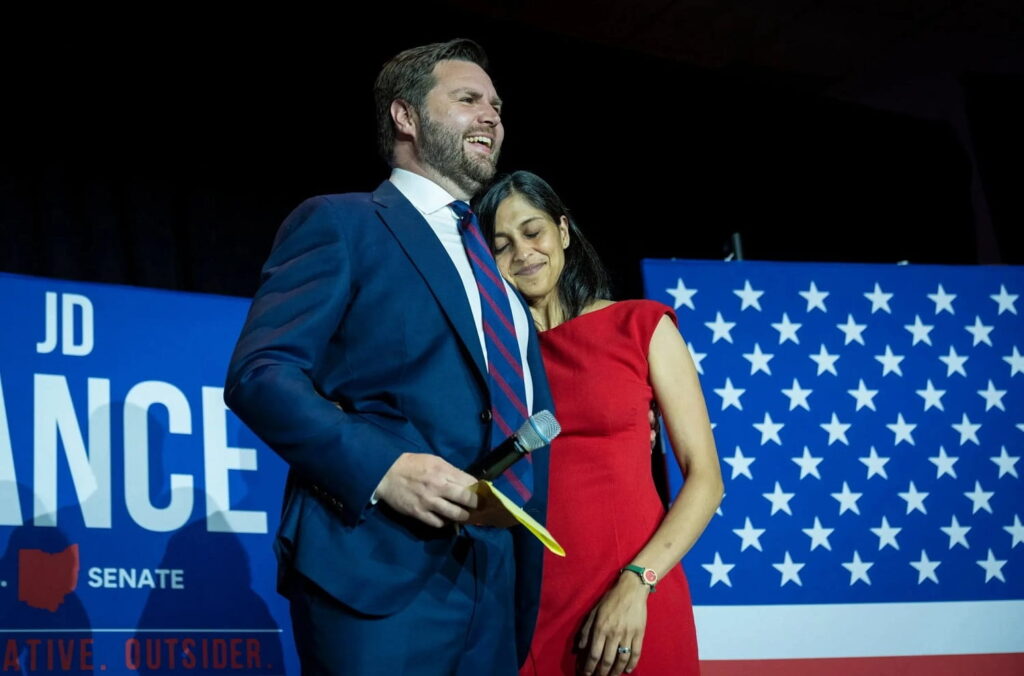 J.D. Vance embraces his wife Usha Vance after winning the primary, at an election night event.